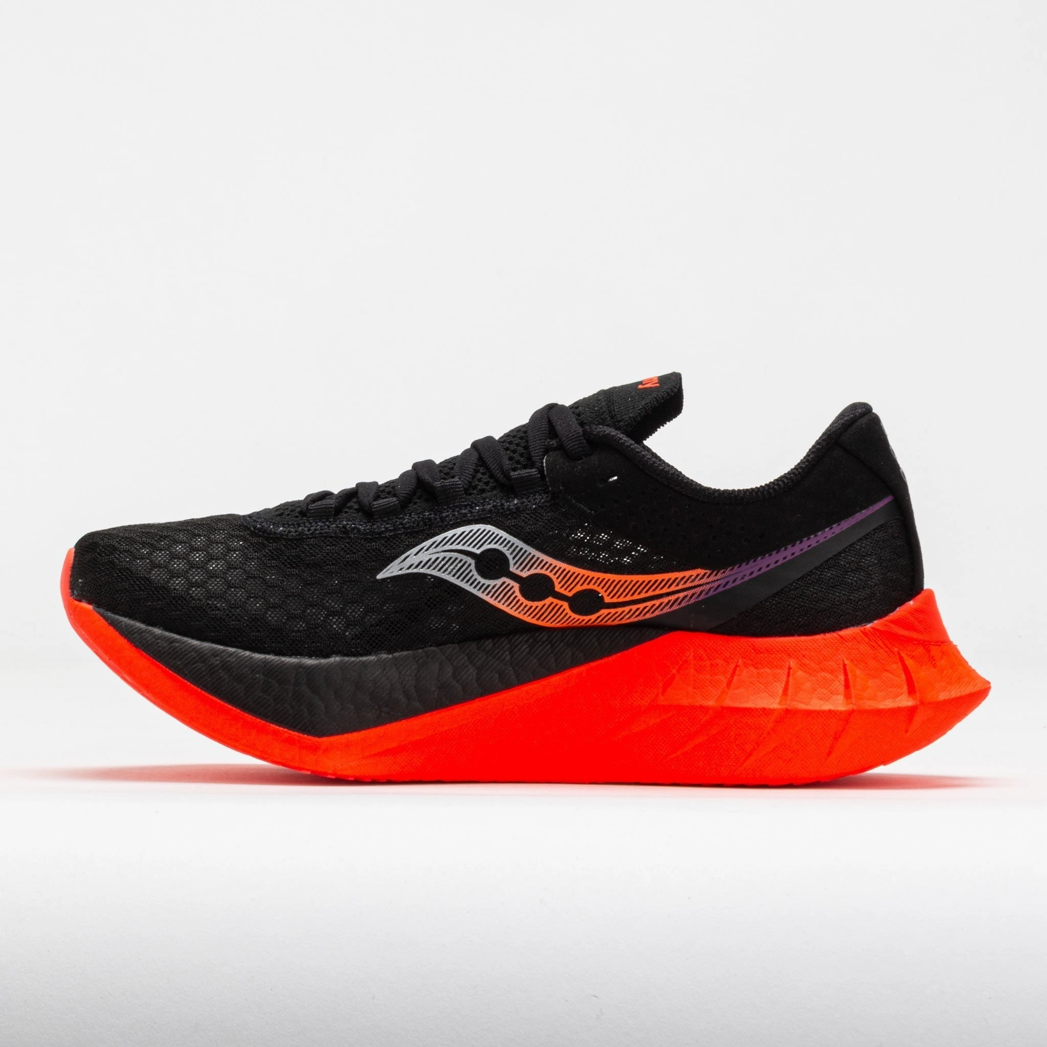 Saucony Endorphin Pro 4 Women's  Black/ViZiRed running with a heart rate monitor running in a relay race
