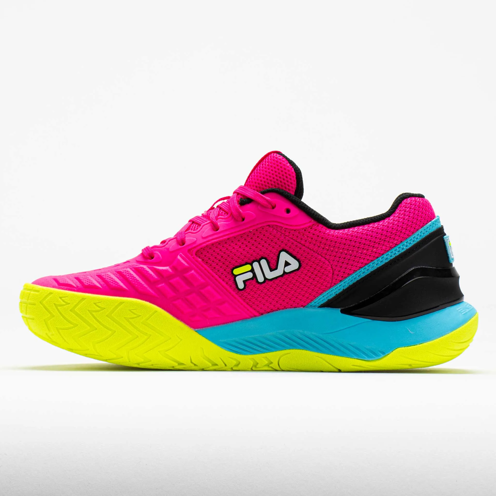 Fila Axilus 3 Energized Women's  Pink Glo/Bluefish/Safety Yellow running in a bus station area shoes