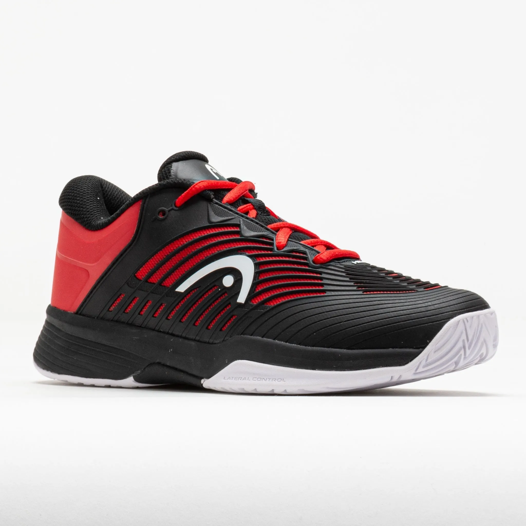 running in a monorail station area shoes Coastal running HEAD Revolt Pro 4.5 Junior  Black/Red