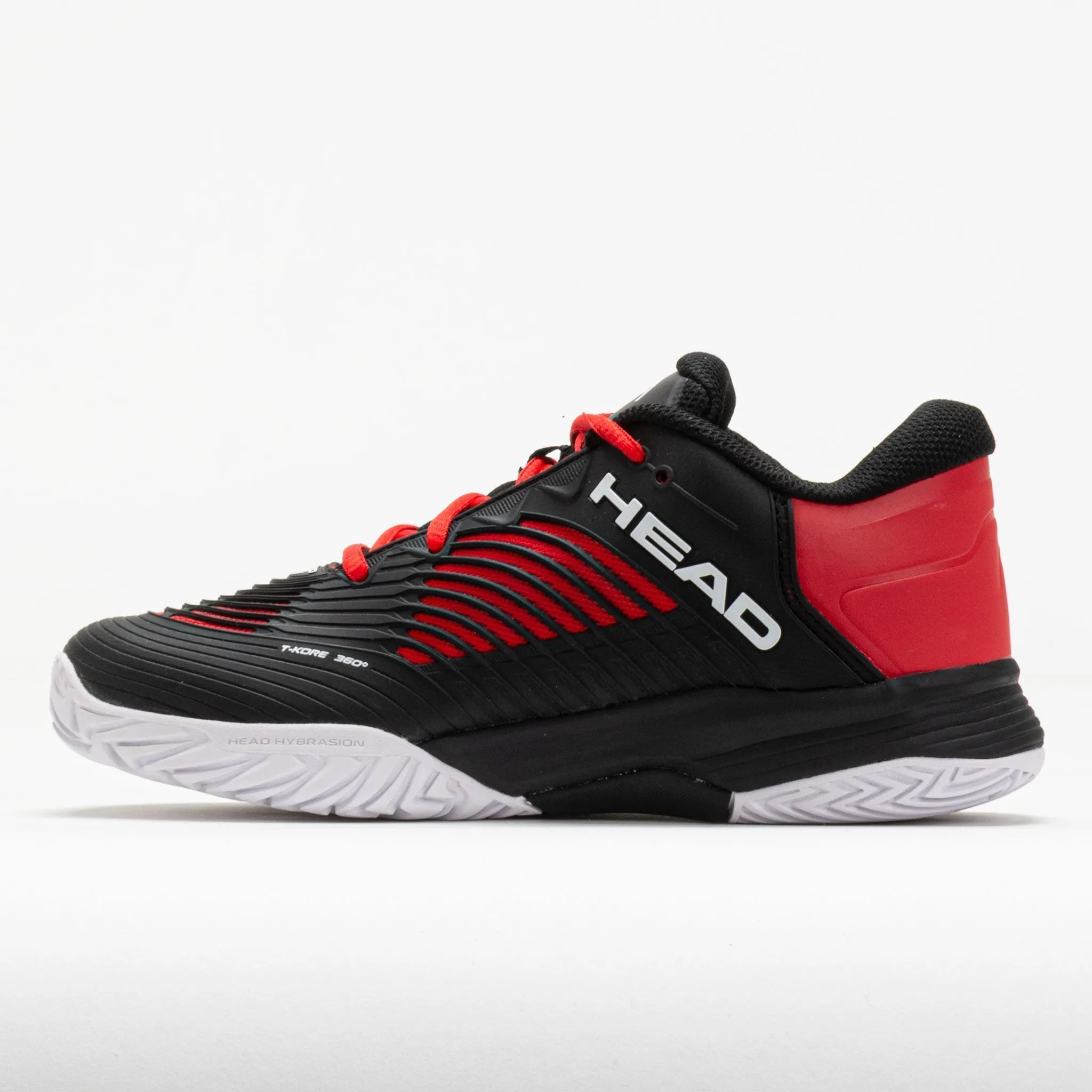 HEAD Revolt Pro 4.5 Junior  Black/Red running with a headlamp carbon - fiber - plate