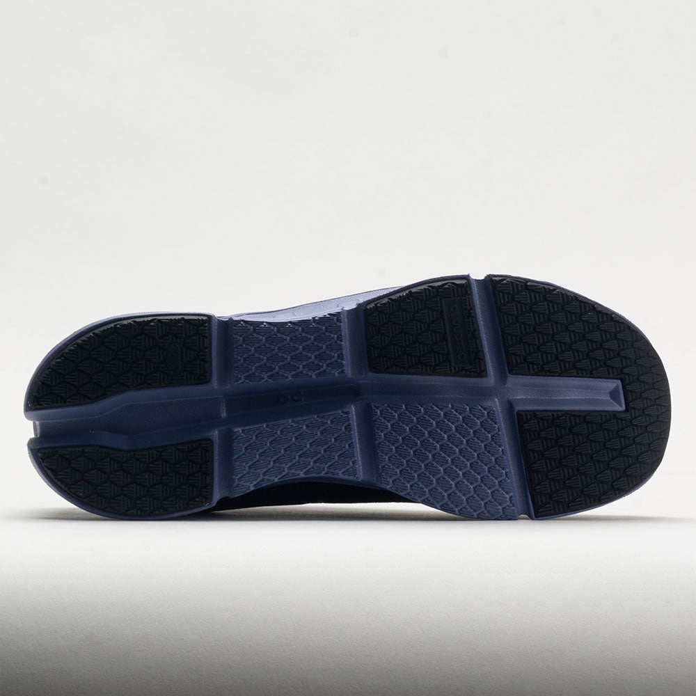 On Cloudgo Men's  Black/Shale running in a ravine area shoes