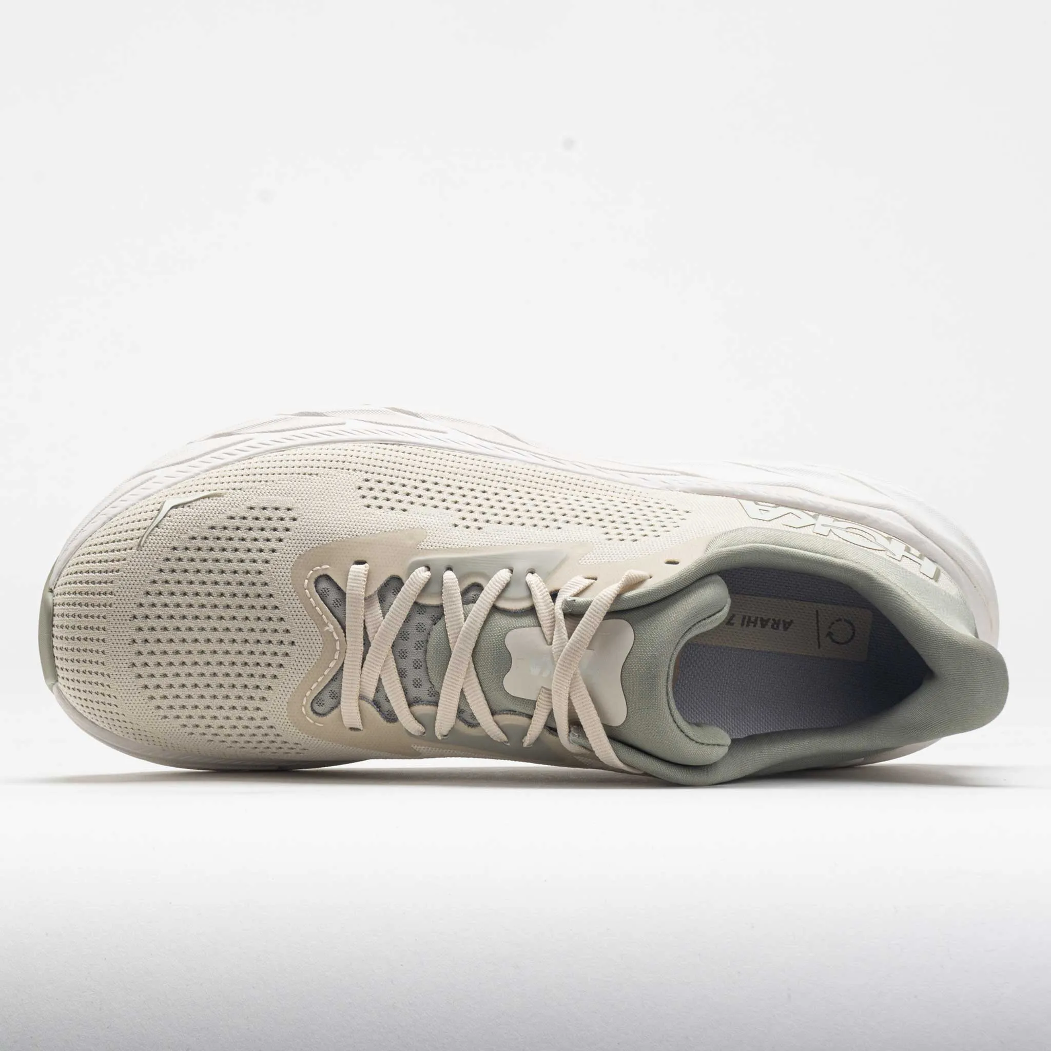 HOKA Arahi 7 Men's  Oat Milk/Barley hybrid shoes running in a tundra area