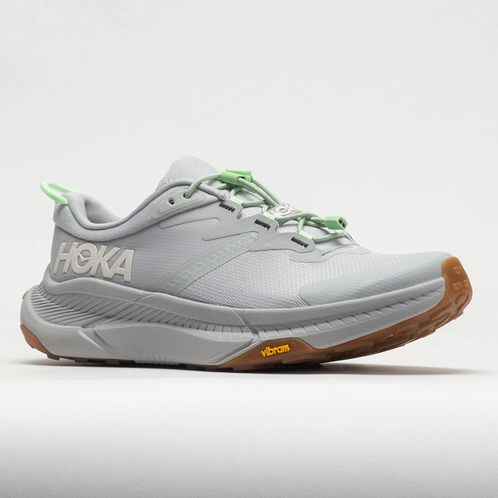 half - size running in a cable car station area shoes HOKA Transport Men's  Harbor Mist/Lime Glow