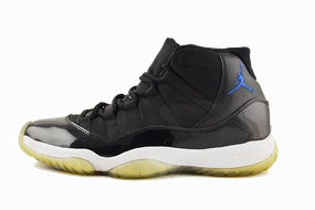 Air Jordan 11 "SpaceJam" running in a tram station area shoes