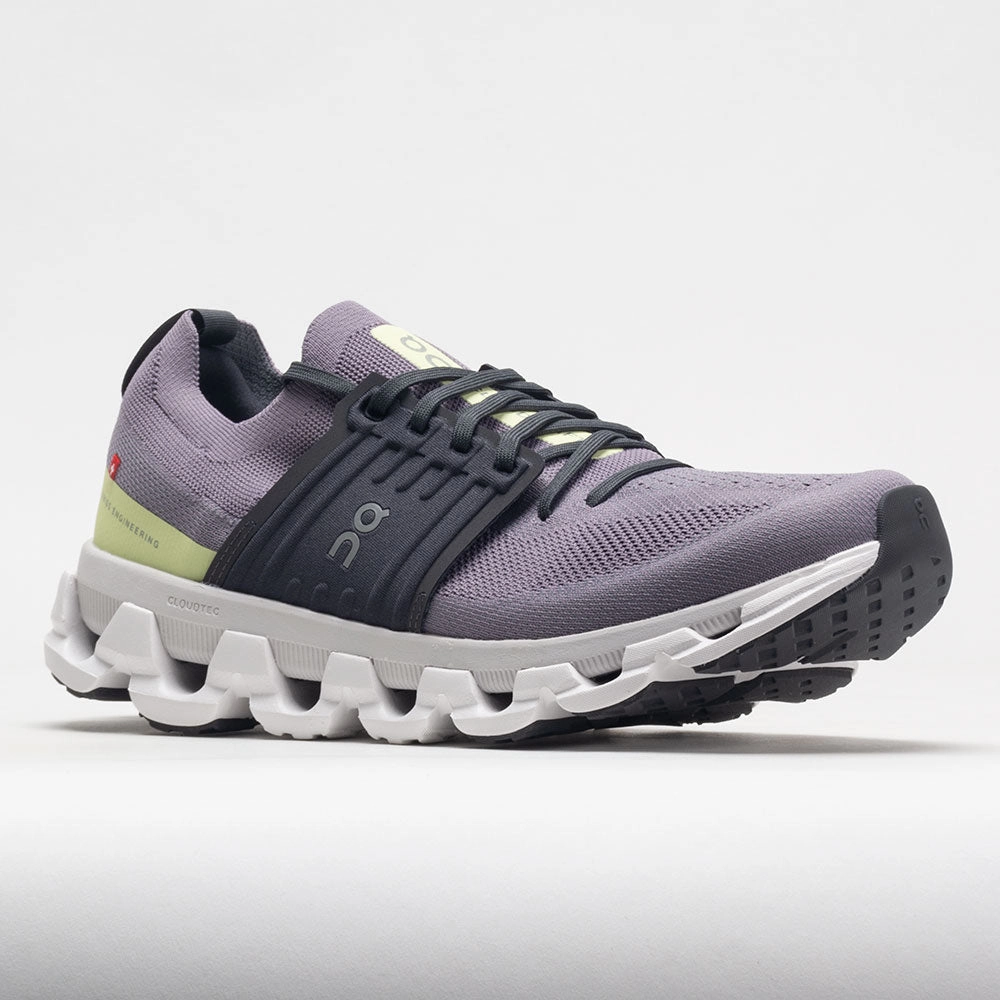 On Cloudswift 3 Men's  Shark/Hay running in a marsh area shoes