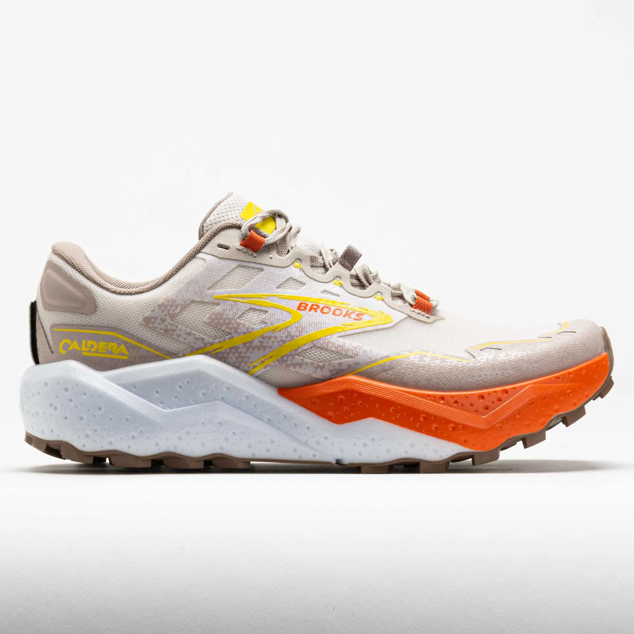 Brooks Caldera 7 Men's  White Sand/Chateau Grey/Yellow Trail runner running in an airport area shoes