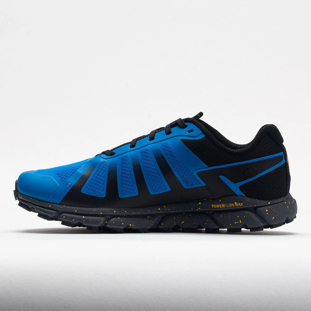 running in an overpass area shoes marathon runner inov-8 TrailFly G 270 Men's  Blue/Nectar