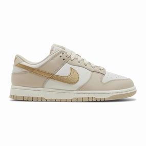 Endurance Style. Women's Nike Dunk Low, Gold Swoosh